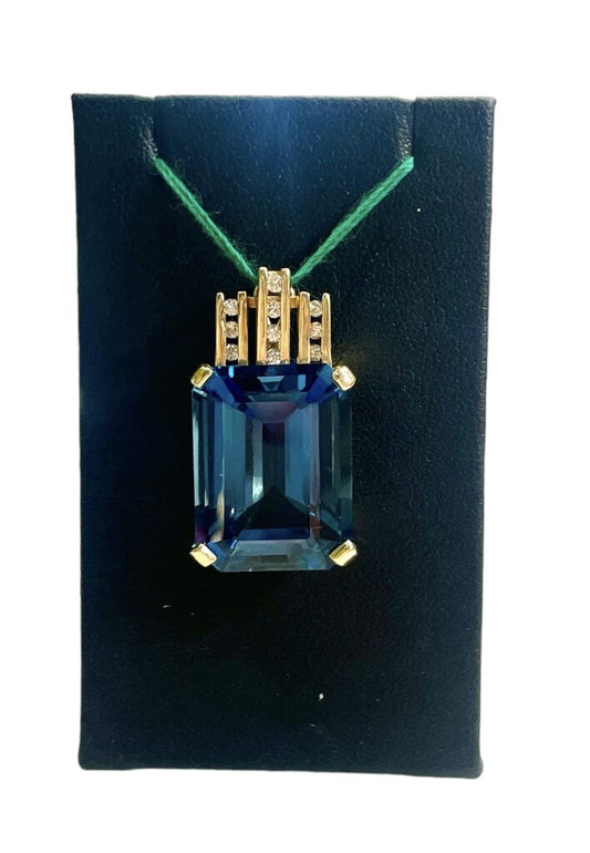 14KT 20X15 MM EMERALD CUT LONDON BLUE TOPAZ W/1/5TW CHANNEL SET DIAMOND SLIDE PENDANT NO CHAIN